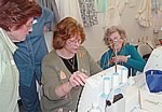 Peggy Dilbone shows school participants how to use the serger for heirloom sewing